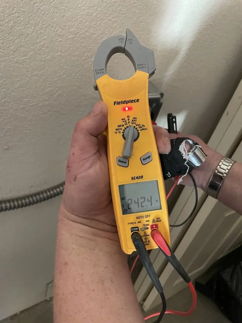 Voltage testing with clamp meter during Hot Tub / Pool Electrical Wiring in Harrah